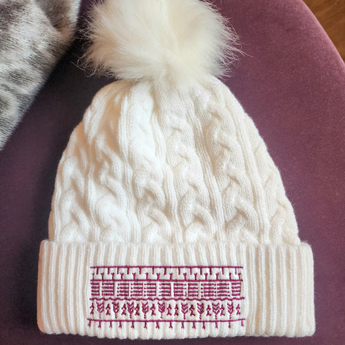 White tunniit hat